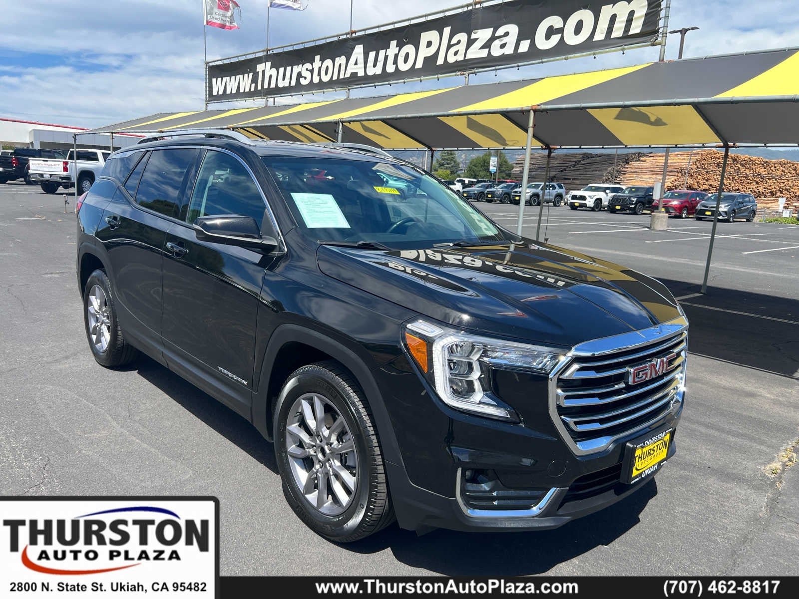 2024 GMC Terrain SLT in Ebony Twilight Metallic — front three-quarter view