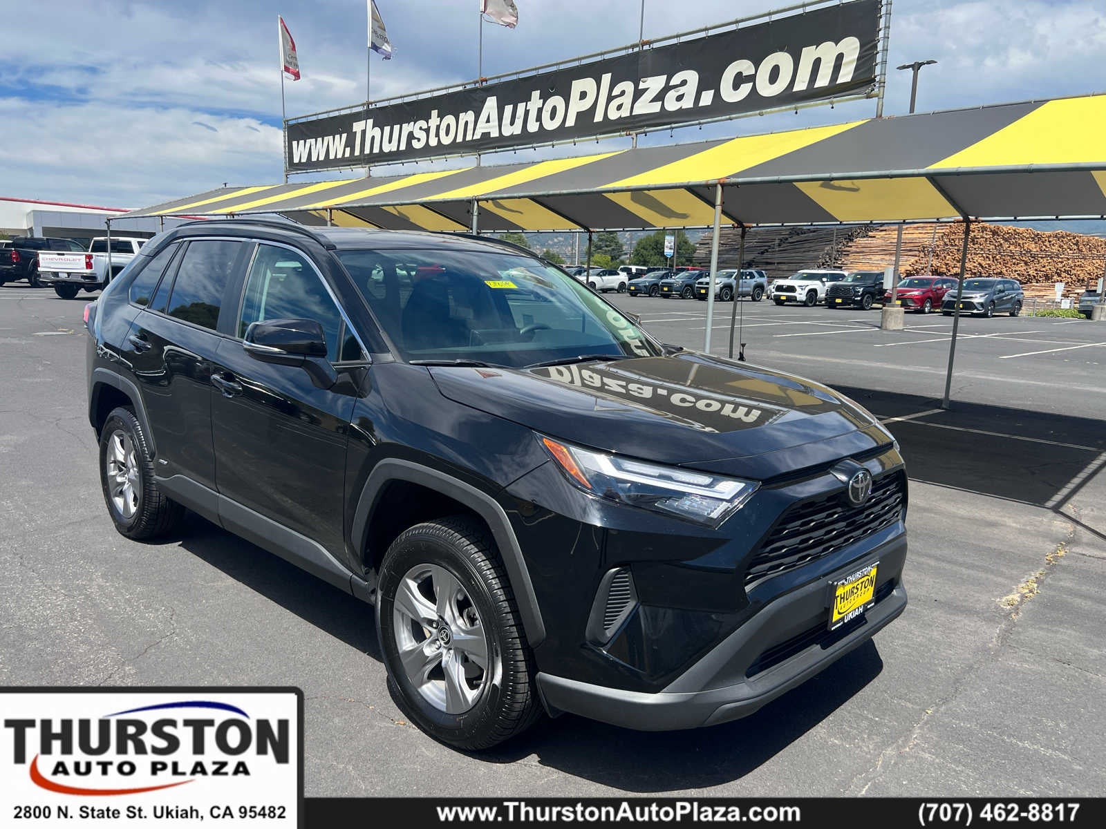 2025 Toyota RAV4 Hybrid XLE in Black — front three-quarter view