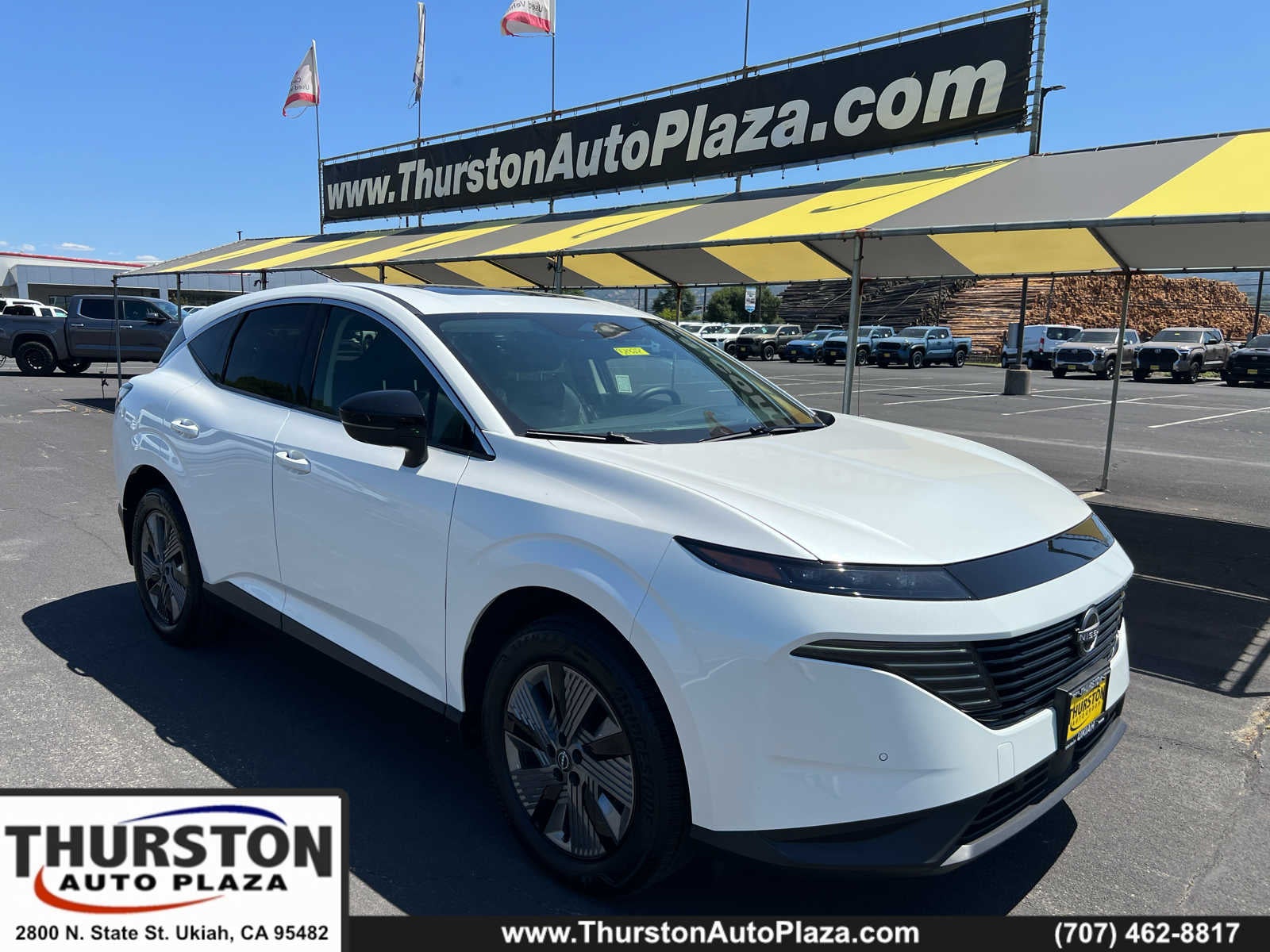 2025 Nissan Murano SL in White — front three-quarter view