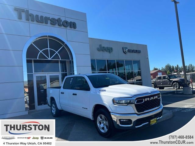 2025 RAM 1500 Big Horn 4x4 Crew Cab 5'7" Box in Bright White Clearcoat — front three-quarter view